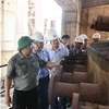 Thủ tướng Phạm Minh Chính kiểm tra, khảo sát các hạng mục của Dự án mở rộng giai đoạn 2 Nhà máy Gang thép Thái Nguyên (Tisco 2). (Ảnh: Dương Giang/TTXVN)