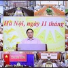Thủ tướng Phạm Minh Chính chủ trì hội nghị tại điểm cầu Chính phủ. (Ảnh: Dương Giang/TTXVN)