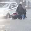 Mưa lớn gây ngập úng cục bộ nhiều tuyến phố chính ở thành phố Thái Bình, gây khó khăn, nguy hiểm cho người và phương tiện tham gia giao thông. (Ảnh: Nguyễn Công Hải/TTXVN)