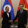 Phó Chủ tịch Thường trực Quốc hội Trần Thanh Mẫn tiếp Tổng Thư ký Quốc hội Lào. (Ảnh: Đức Thọ/TTXVN)