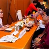 Các doanh nghiệp Đà Nẵng và Ấn Độ trao đổi thông tin về du lịch tại chương trình quảng bá du lịch. (Ảnh: TTXVN phát)
