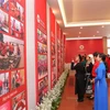 Thông qua triển lãm, Hội Chữ thập Đỏ Việt Nam mong muốn gửi tới thông điệp về niềm tự hào, phát huy truyền thống nhân ái của dân tộc. (Ảnh: Thanh Tùng/TTXVN)