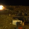 Lực lượng pháo binh Israel đáp trả vụ pháo kích từ Liban. (Ảnh: TTXVN phát)