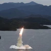 Một vụ phóng thử tên lửa Hokkaido, do đơn vị tác chiến hạt nhân chiến thuật thuộc Quân đội Nhân dân Triều Tiên tiến hành, tại địa điểm không xác định. (Ảnh: AFP/TTXVN)
