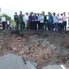 Phó Thủ tướng Lê Văn Thành kiểm tra công tác khắc phục tại tuyến đường Quốc lộ 15D đoạn đi qua xã A Ngo, huyện miền núi Đakrông. (Ảnh: Thanh Thủy/TTXVN)