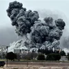Khói bốc lên sau một cuộc không kích xuống thị trấn Ain al-Arab của Syria, giáp giới với tỉnh Sanliurfa, Thổ Nhĩ Kỳ. (Ảnh minh họa: AFP/TTXVN)