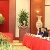 Tổng Bí thư Nguyễn Phú Trọng nói chuyện thân mật với các đại biểu dự Hội nghị biểu dương Chủ tịch Mặt trận Tổ quốc cấp xã và Trưởng ban Công tác Mặt trận tiêu biểu toàn quốc. (Ảnh: Trí Dũng/TTXVN)