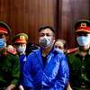 Bị cáo Nguyễn Minh Khải tại phiên tòa ngày 30/11. (Ảnh: Thành Chung/TTXVN)