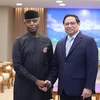 Thủ tướng Phạm Minh Chính tiếp Phó Tổng thống Nigeria Yemi Osinbajo. (Ảnh: Dương Giang/TTXVN)