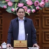 Thủ tướng Phạm Minh Chính chủ trì họp Thường trực Chính phủ về chính sách tài khóa, tiền tệ. (Ảnh: Dương Giang/TTXVN)