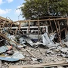 Hiện trường một vụ đánh bom tại Mogadishu, Somalia, ngày 25/11/2021. (Ảnh: AFP/TTXVN)