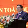 Thủ tướng Phạm Minh Chính phát biểu chỉ đạo Hội nghị Công an toàn quốc. (Ảnh: Dương Giang/TTXVN)