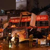 Vụ nổ diễn ra vào lúc 19h05 ngày 27/12 tại phố Hoàng Công Chất, quận Bắc Từ Liêm. (Ảnh: Huy Hùng/TTXVN)