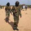 Các tay súng nghi là thành viên Al-Shabaab bị bắt giữ tại Mogadishu, Somalia, ngày 28/2/2014. (Ảnh: AFP/ TTXVN)