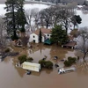 Cảnh ngập lụt do ảnh hưởng của bão tại Gilroy, bang California, Mỹ ngày 9/1. (Ảnh: AFP/TTXVN)