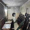 Số vũ khí được cất giấu tại căn hầm số 287/70 Nguyễn Đình Chiểu, Quận 3, Thành phố Hồ Chí Minh. (Ảnh: Hứa Chung/TTXVN)