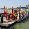 Lễ nghinh thần bằng đường thủy trên sông Đồng Nai. (Ảnh: Công Phong/TTXVN)
