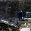 Lực lượng cứu hộ nỗ lực tìm kiếm nạn nhân tại hiện trường vụ rơi máy bay ở Pokhara, Nepal, ngày 16/1/2023. (Ảnh: THX/TTXVN)