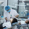 Khám chữa bệnh tại Chuyên Khoa Răng hàm mặt, Bệnh viện Đa khoa Sông Thương, Bắc Giang. (Ảnh minh họa: Danh Lam-TTXVN)