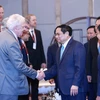 Thủ tướng Phạm Minh Chính với đại diện các tổ chức quốc tế tham dự Diễn đàn doanh nghiệp Việt Nam thường niên 2023.