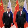 Chủ tịch Trung Quốc Tập Cận Bình (phải) trong cuộc gặp Tổng thống Nga Vladimir Putin tại Bắc Kinh, ngày 4/2/2022. (AFP/TTXVN)