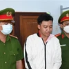Bị can Nguyễn Thành Tâm tại thời điểm bị bắt tạm giam. (Ảnh: TTXVN phát)