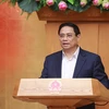 Thủ tướng Phạm Minh Chính chủ trì Hội nghị trực tuyến Chính phủ với địa phương. (Ảnh: Dương Giang/TTXVN)