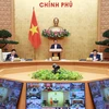 Thủ tướng Phạm Minh Chính chủ trì Hội nghị trực tuyến Chính phủ với địa phương. (Ảnh: Dương Giang/TTXVN)