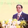 Thủ tướng Phạm Minh Chính phát biểu tại Lễ Kỷ niệm 70 năm Ngày Truyền thống Lực lượng An ninh kinh tế. (Ảnh: Dương Giang/TTXVN)