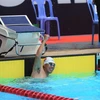 Pha ăn mừng giành huy chương Vàng bơi lội của Vận động viên Người Khuyết tật Việt Nam Võ Thanh Tùng. (Ảnh: Hoàng Minh/TTXVN)