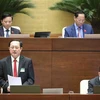 Bộ trưởng Bộ Khoa học và Công nghệ Huỳnh Thành Đạt trả lời chất vấn. (Ảnh: Minh Đức/TTXVN)