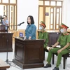 Đối tượng Ninh Thị Vân Anh tại Cơ quan Cảnh sát điều tra. (Ảnh: TTXVN phát)