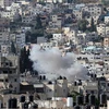 Khói bốc lên sau cuộc không kích do Israel tiến hành tại thành phố Jenin, phía Bắc khu Bờ Tây ngày 3/7/2023. (Ảnh: AFP/TTXVN)