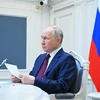 Tổng thống Nga Vladimir Putin tham dự Hội nghị thượng đỉnh Tổ chức Hợp tác Thượng Hải (SCO) dưới hình thức trực tuyến ngày 4/7/2023. (Ảnh: AFP/TTXVN)