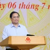Thủ tướng Phạm Minh Chính chủ trì làm việc với Hiệp hội Doanh nghiệp Vừa và Nhỏ. (Ảnh: Dương Giang/TTXVN)