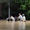 Cảnh ngập lụt tại New Delhi, Ấn Độ ngày 13/7. (Ảnh: THX/TTXVN)