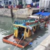 Tàu cá KG 94351 TS do ông Phạm Minh Dũng, thường trú phường 11, thành phố Vũng Tàu làm chủ phương tiện, đang neo đậu tại khu vực cầu Cảng cá Cát Lở. (Ảnh: TTXVN phát)