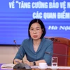 Bà Vũ Việt Trang, Bí thư Đảng ủy, Tổng Giám đốc, Trưởng Ban Chỉ đạo 35 TTXVN phát biểu. (Ảnh: Tuấn Đức/TTXVN)