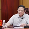 Thủ tướng Phạm Minh Chính chủ trì làm việc với lãnh đạo chủ chốt tỉnh Long An. (Ảnh: Dương Giang/TTXVN)