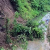 Sạt lở đất, đá gây ách tắc giao thông cục bộ tại Quốc lộ 279D, thuộc huyện Mường La, Sơn La. (Ảnh: Quang Quyết/TTXVN)
