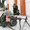 Chiến sỹ Trung đoàn Gia Định huấn luyện các phương án sẵn sàng chiến đấu bảo vệ các mục tiêu, trụ sở của Thành phố Hồ Chí Minh trong ngày lễ, Tết của dân tộc. (Ảnh: Trọng Đức/TTXVN)