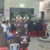 Đám tang của 3 mẹ con bị nghi đầu độc bằng khí CO tại thôn Vĩnh Đông, xã Cam An Nam, huyện Cam Lâm, tỉnh Khánh Hòa. (Ảnh: TTXVN phát)