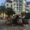 Rác thải sinh hoạt được tập kết tại một khu vực trước khi chuyển về địa điểm xử lý rác. (Nguồn: Vietnam+)