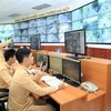 Cảnh sát Giao thông làm nhiệm vụ tại Trung tâm Điều khiển Giao thông Hà Nội. (Ảnh minh họa: Doãn Tấn/TTXVN)