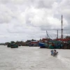Tàu cá neo đậu tại Cửa biển Khánh Hội - U Minh. (Ảnh: Kim Há/TTXVN)