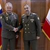 Bộ trưởng Quốc phòng Iran Mohammad-Reza Ashtiani và người đồng cấp Nga Sergei Shoigu. (Nguồn: AP)