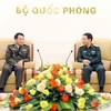 Bộ trưởng Bộ Quốc phòng Phan Văn Giang tiếp Tổng Tư lệnh Quân đội Hoàng gia Campuchia Vong Pisen. (Ảnh: An Đăng/TTXVN)