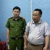 Đối tượng Nguyễn Văn Minh tại cơ quan điều tra. (Ảnh: TTXVN phát)