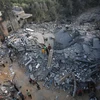 Các tòa nhà bị phá hủy sau cuộc không kích của Israel xuống Dải Gaza ở Rafah ngày 14/10/2023. (Ảnh: THX/TTXVN)