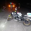 Phạm Minh Huy điều khiển xe ôtô đâm ngã xe môtô của lực lượng Cảnh sát giao thông đang làm nhiệm vụ. (Ảnh: TTXVN phát)